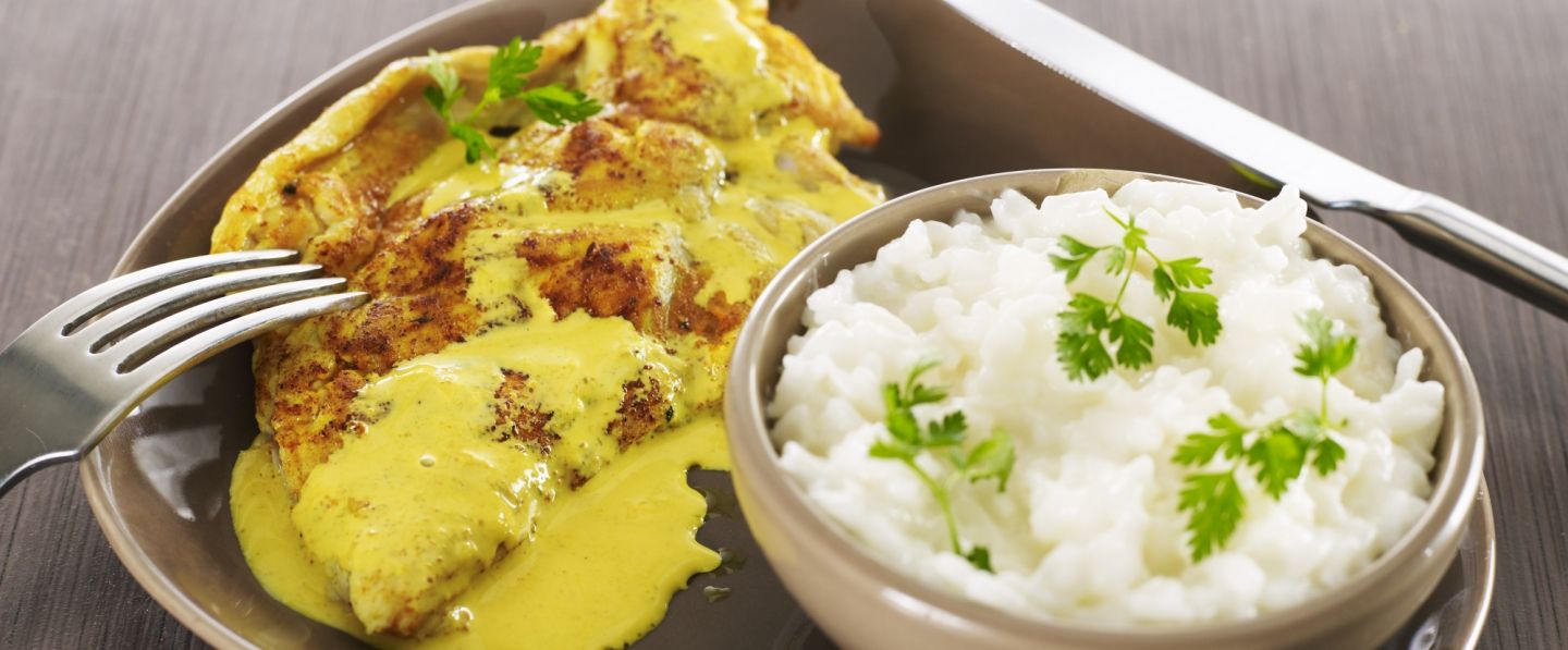Escalopes de dinde au curry et son riz crémeux