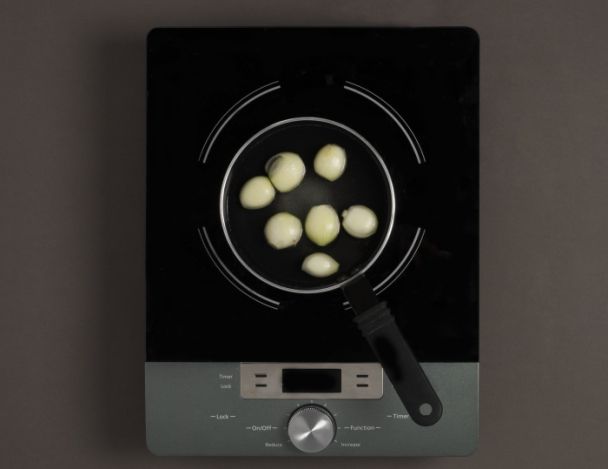 Cuisson des oignons grelots