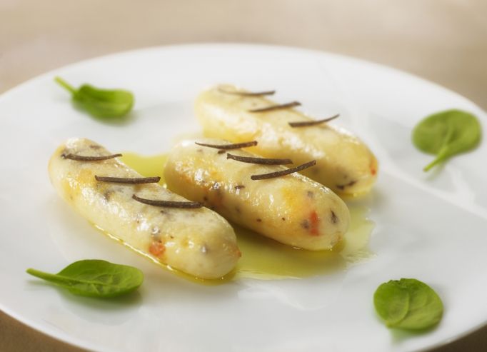 Saint-Jacques en petits boudins légèrement truffés, sauce truffe